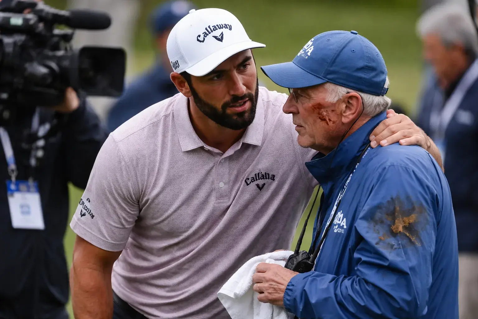 Jon Rahm reacting to a shot during a professional golf tournament