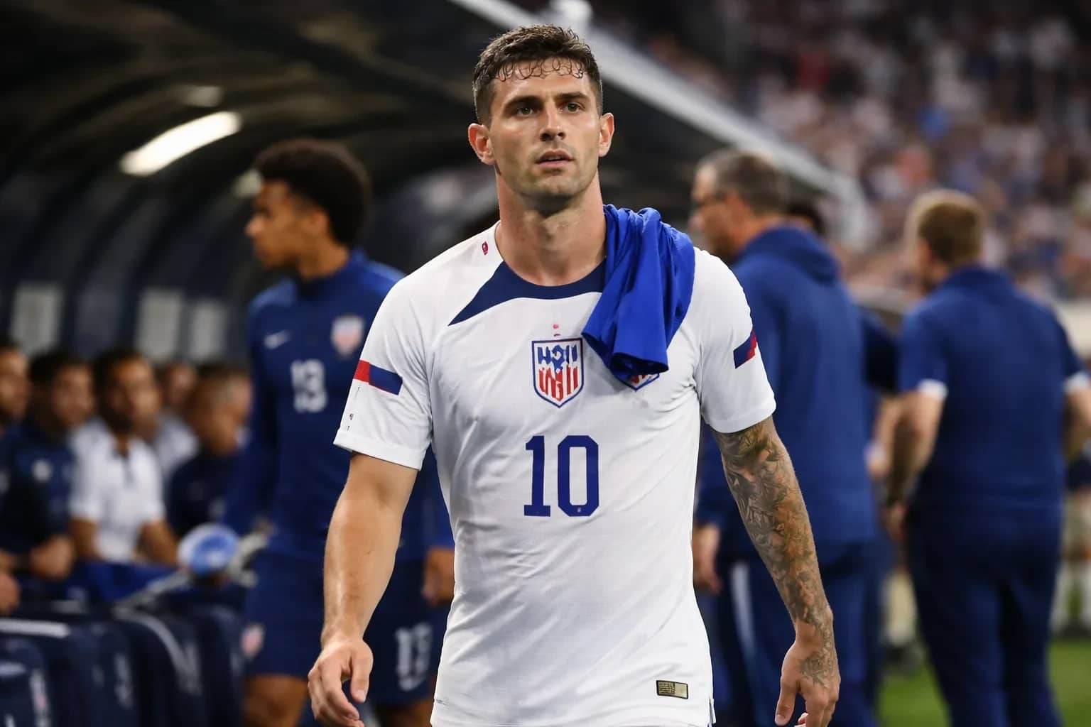 Christian Pulisic and USMNT teammates during a match.