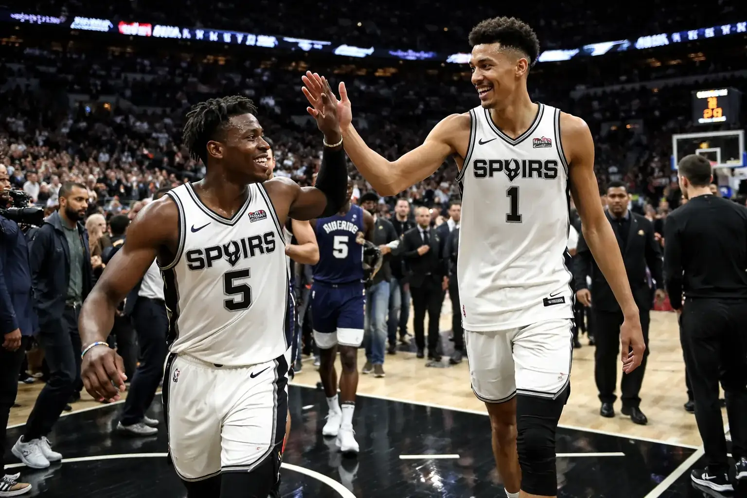 San Antonio Spurs players celebrating a score during their Game 2 victory over the Minnesota Timberwolves.