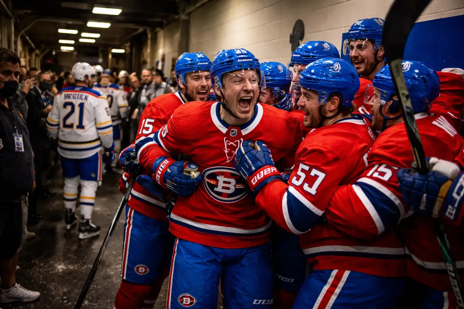 Alex Newhook celebrating his game-winning goal for the Montreal Canadiens in Game 7 against the Buffalo Sabres.