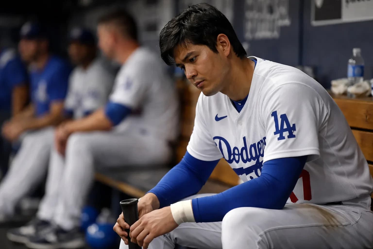 Shohei Ohtani of the Los Angeles Dodgers watches his leadoff home run.