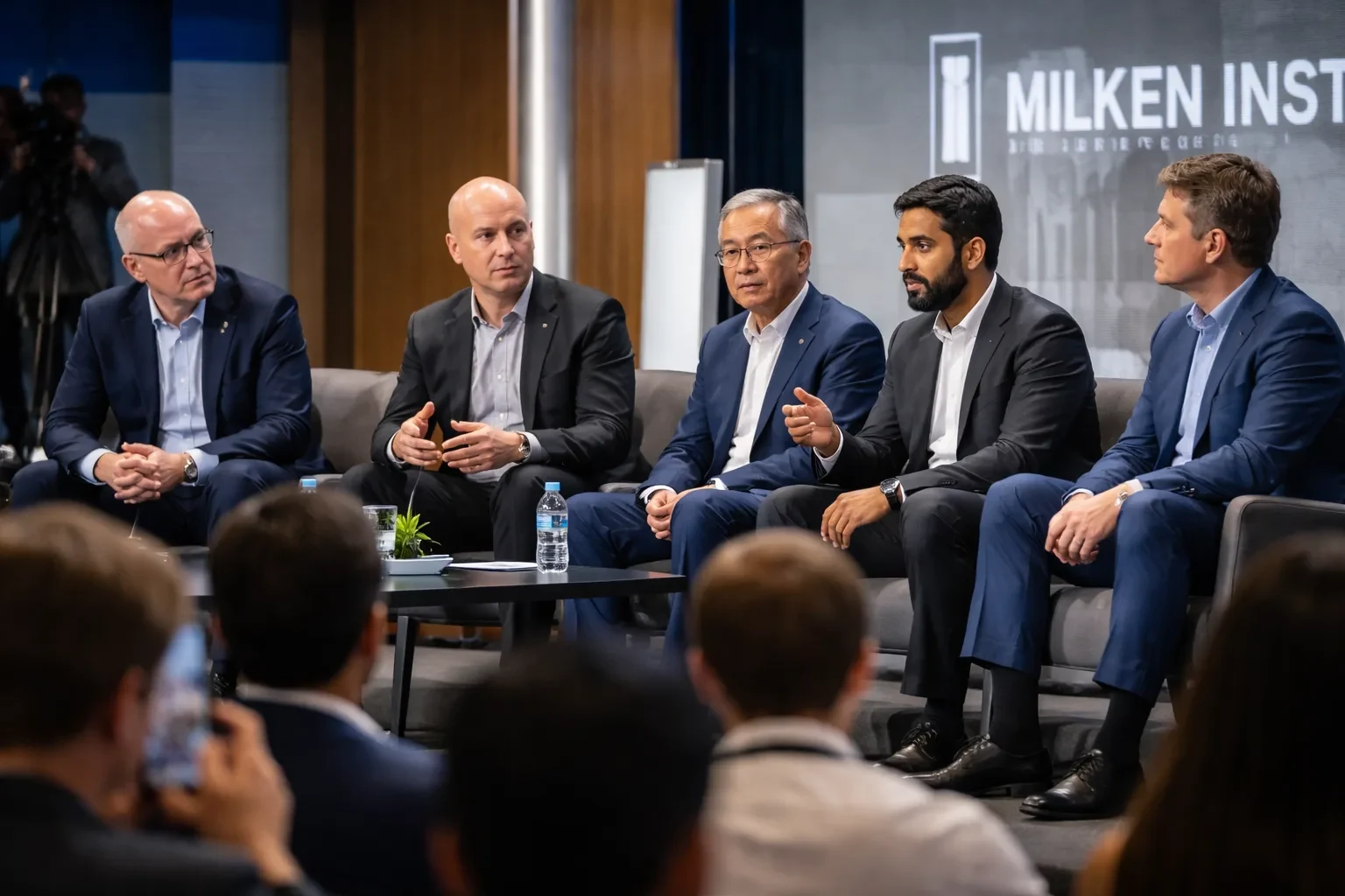 Panel of AI industry leaders at the Milken Institute Global Conference discussing infrastructure challenges.