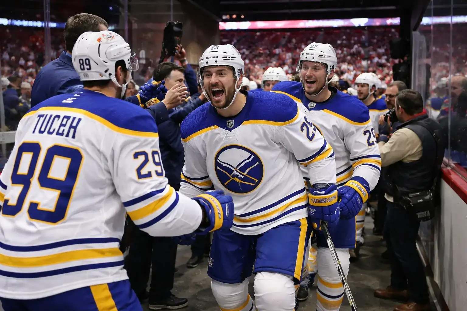 Buffalo Sabres players celebrating a power play goal during Game 1 against the Montreal Canadiens.